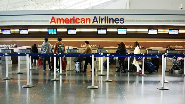 Retractable belt stanchions at American Airlines baggage check 
